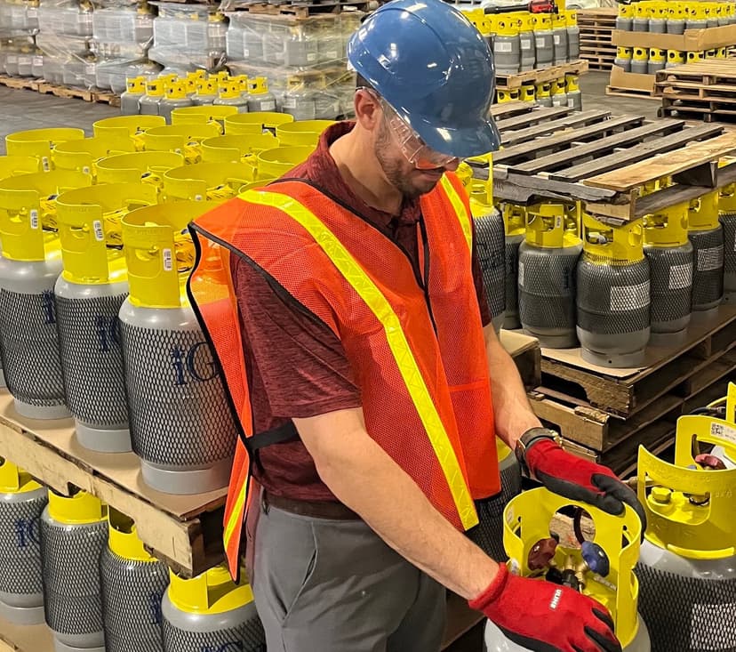 Worker inspecting reclaim tanks